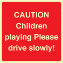 caution-children-playing-please-drive-slowly~